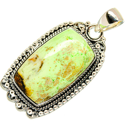 Sterling silver chrysoprase pendant with oval green-yellow stone and ornate bezel