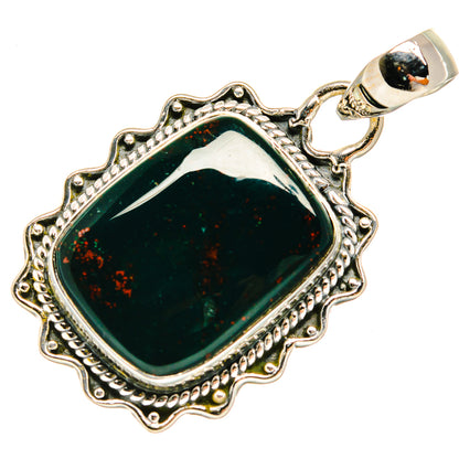 Rectangular green bloodstone pendant with raised silver filigree border and round bail