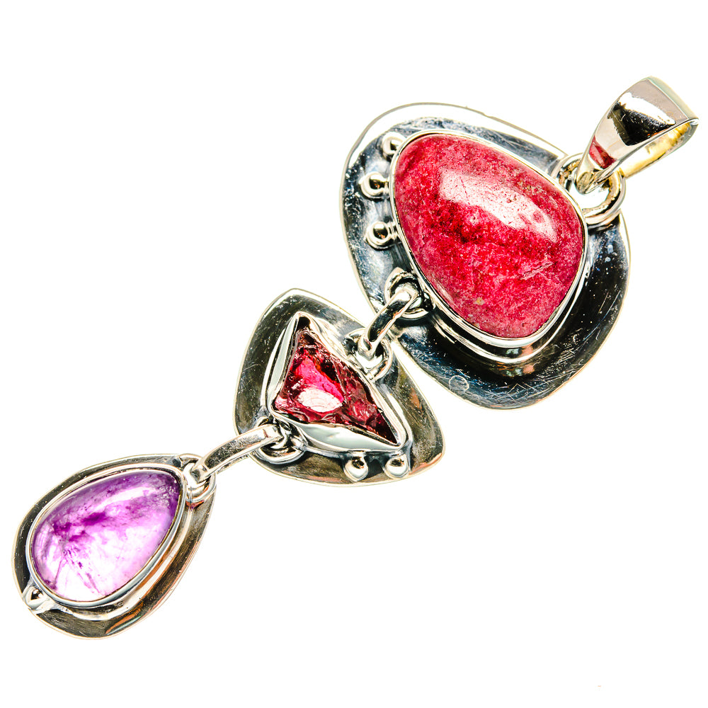 Sterling silver pendant set with red oval and purple teardrop cabochons on chain