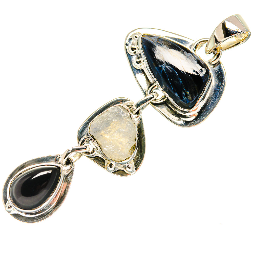 Sterling silver pendant with black onyx teardrop and moonstone-like oval accents