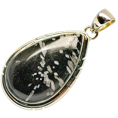 Sterling silver teardrop pendant with black stone, silver fleck pattern, capped bail