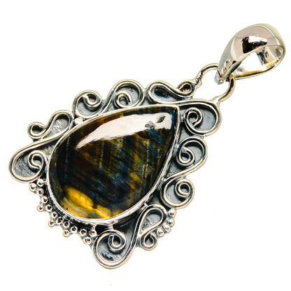 Labradorite pendant with teardrop stone, ornate sterling silver filigree and loop bail.