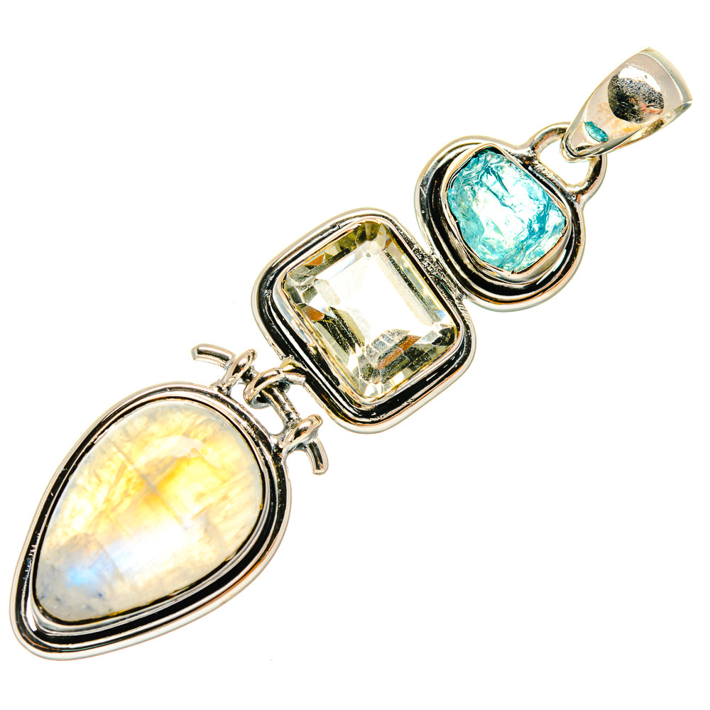 Sterling silver pendant with oval opal, blue oval gemstone, and faceted clear stone accents