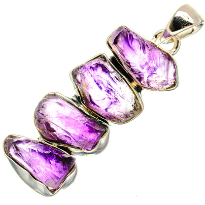 Rough amethyst pendant with 3 purple rough stones in silver bezel setting