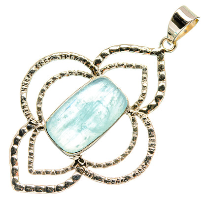 Aquamarine oval pendant with decorative swirl frame in 925 sterling silver.