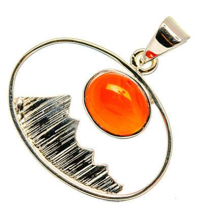 Oval 925 sterling silver carnelian pendant with orange stone and textured skyline frame