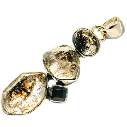 Silver pendant with three faceted gold-and-black stones, black onyx square accents