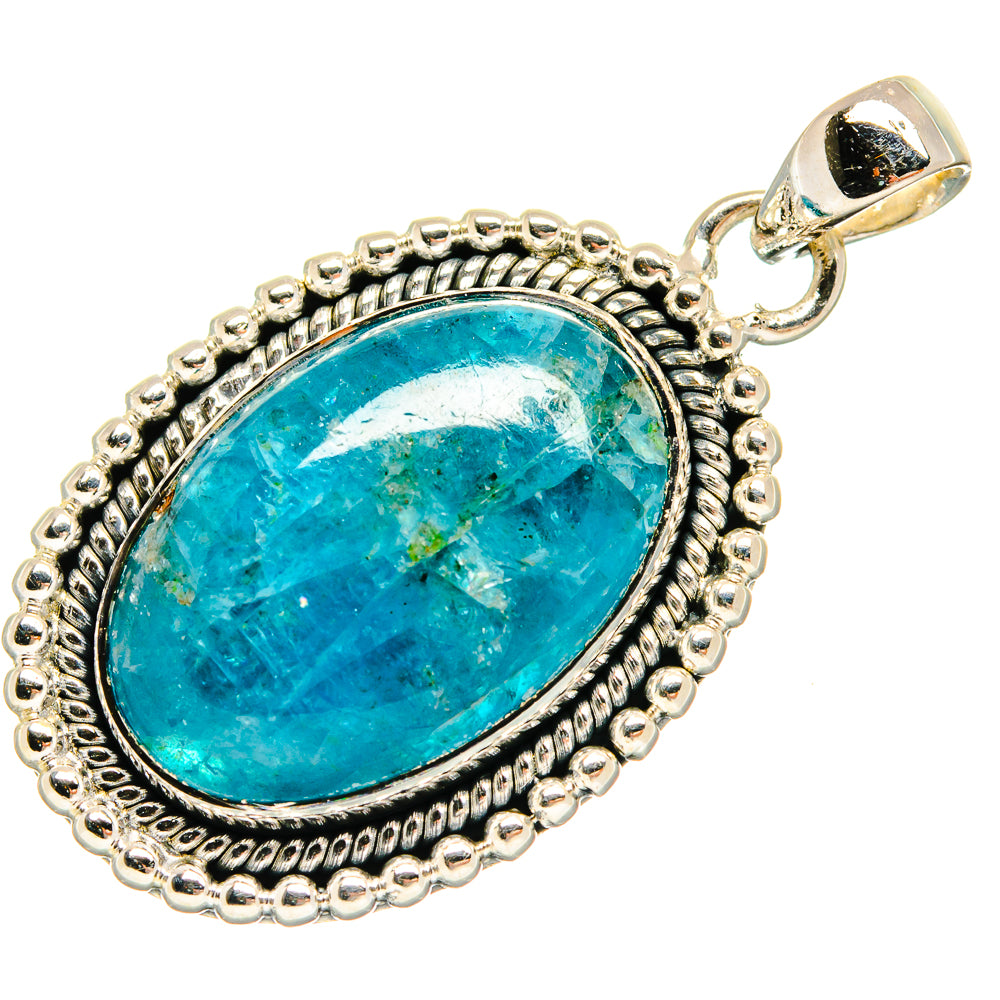 Oval turquoise apatite pendant with ornate border and round bail, full view