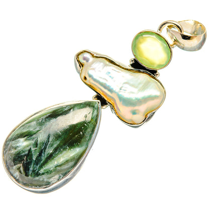Sterling silver pendant with iridescent mother-of-pearl and green teardrop stones