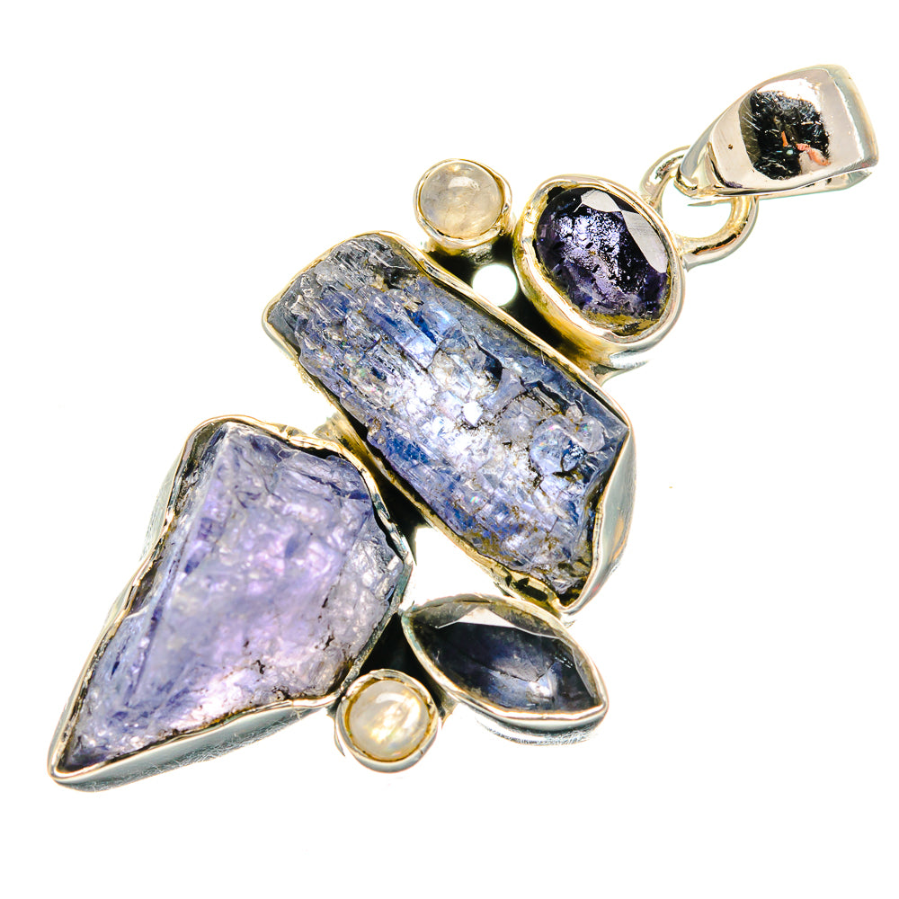 Rough stone pendant with silver prongs, purple/blue crystals and small round accents