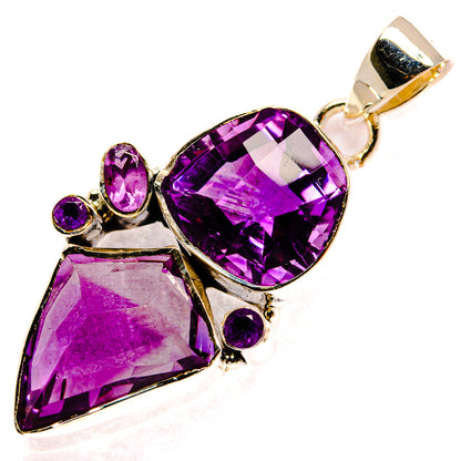Amethyst pendant with faceted oval purple stone, triangular and round accents in sterling silver