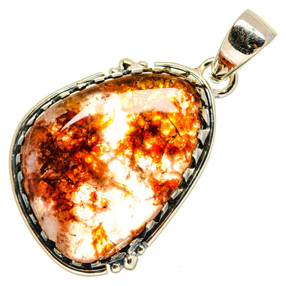 Teardrop amber agate pendant with bright silver frame and bail loop, prong bezel