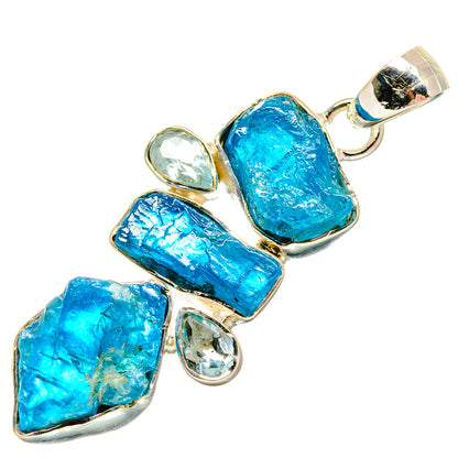 Sterling silver pendant with rough blue gemstone cluster and teardrop clear accent stones