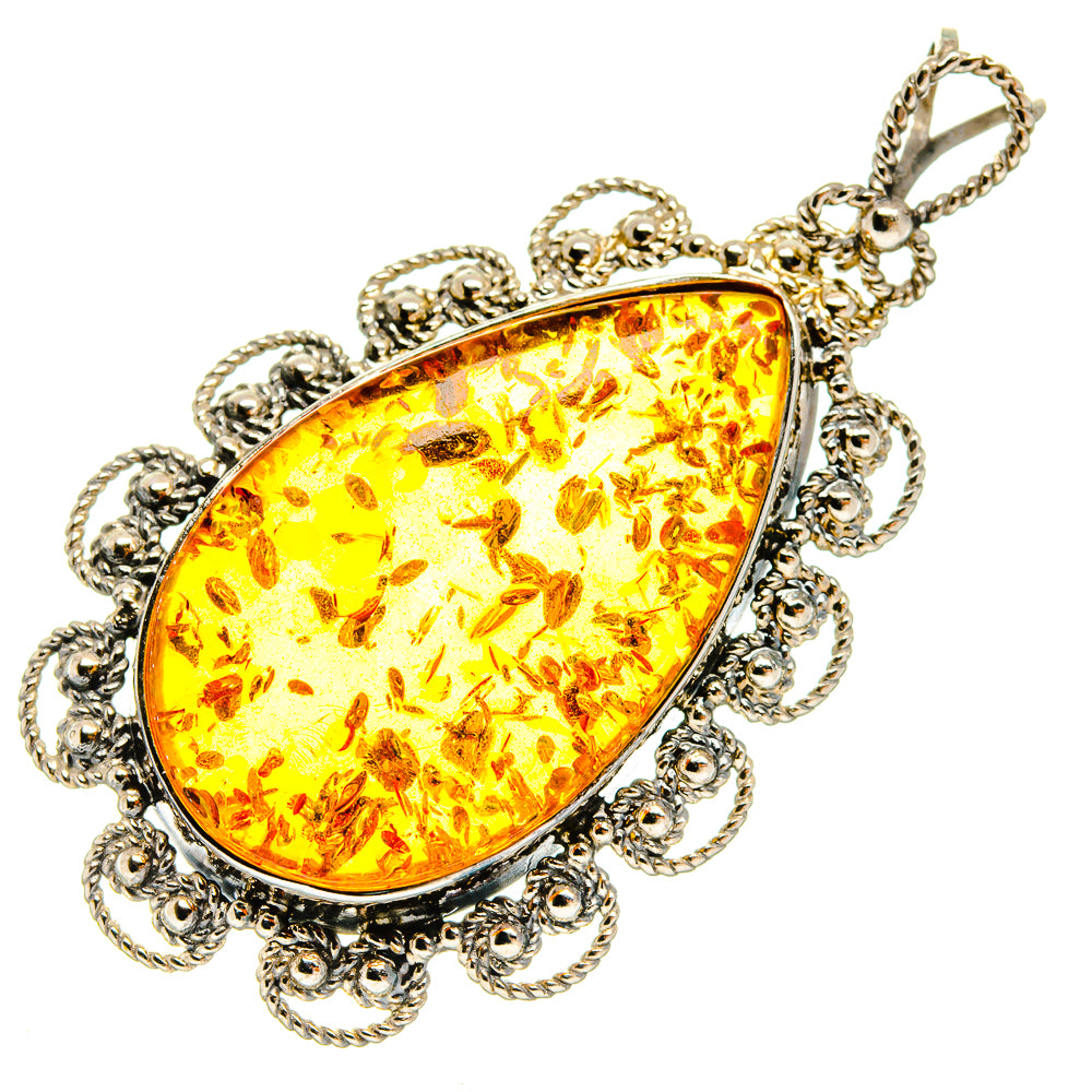 Amber teardrop pendant with ornate 925 sterling silver filigree and necklace chain