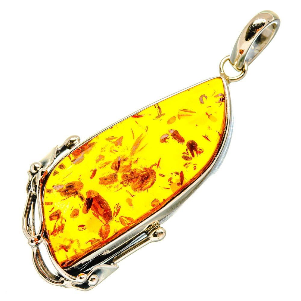 Yellow amber teardrop pendant with 925 sterling silver frame and top bail