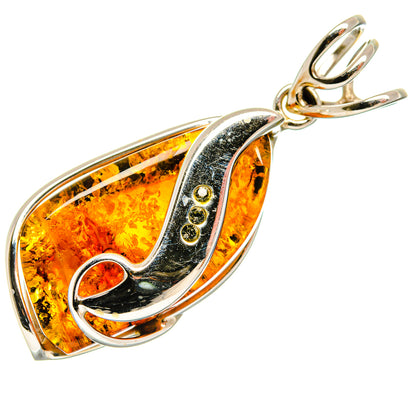 Amber teardrop pendant with 925 sterling silver bail and dark bordered oval stone