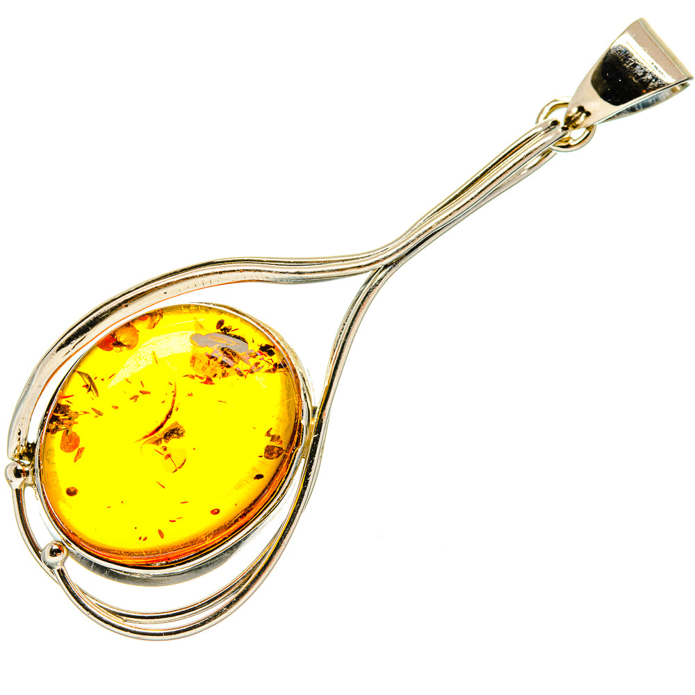 Sterling silver amber pendant with oval cabochon in triple wire swirl design