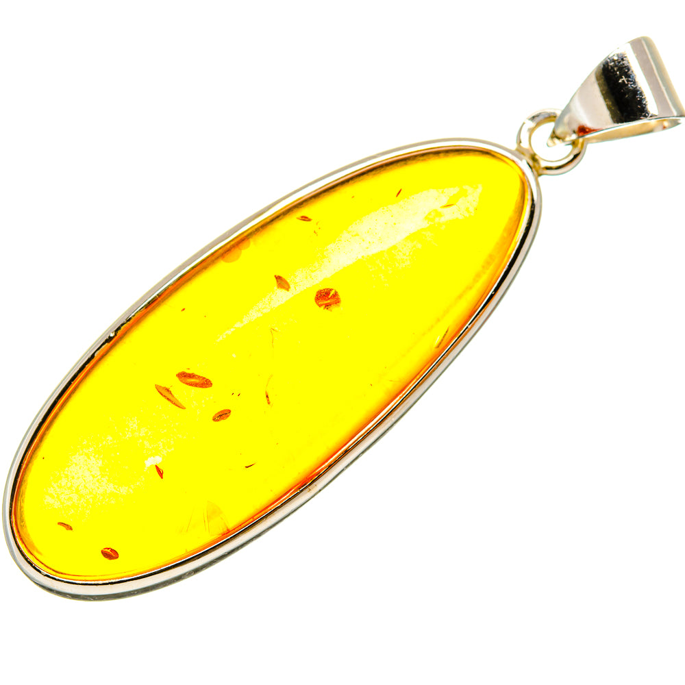 925 sterling silver teardrop pendant with bright yellow Baltic amber, loop bail