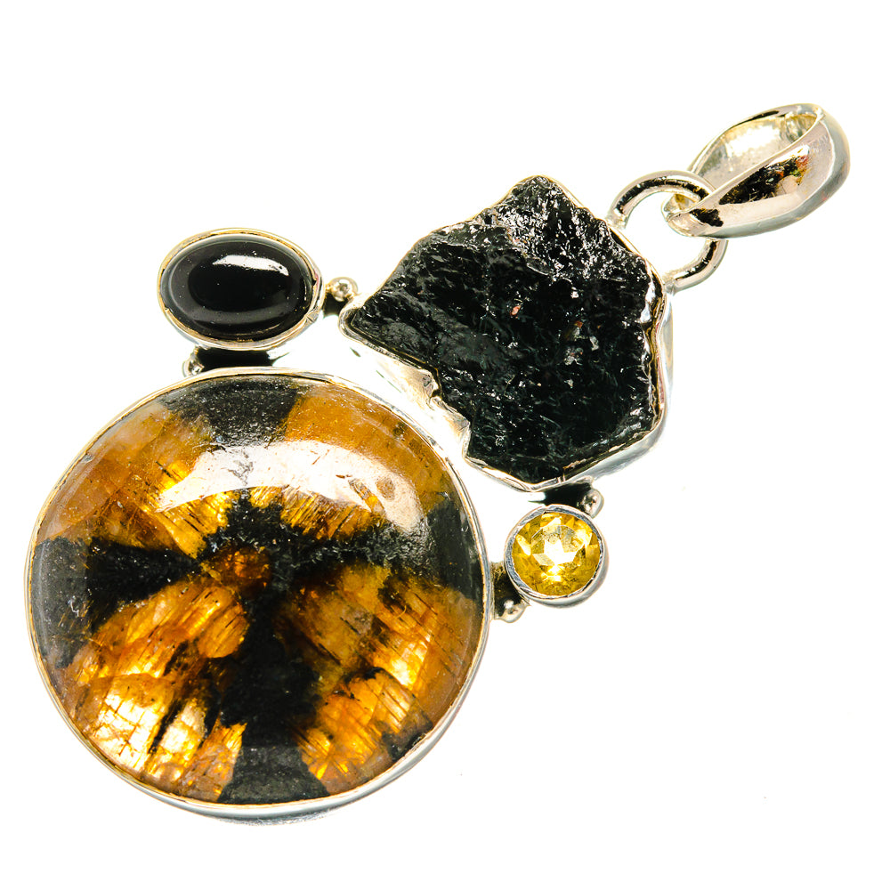Sterling silver pendant with round black onyx, gold citrine bead, and rough black stone