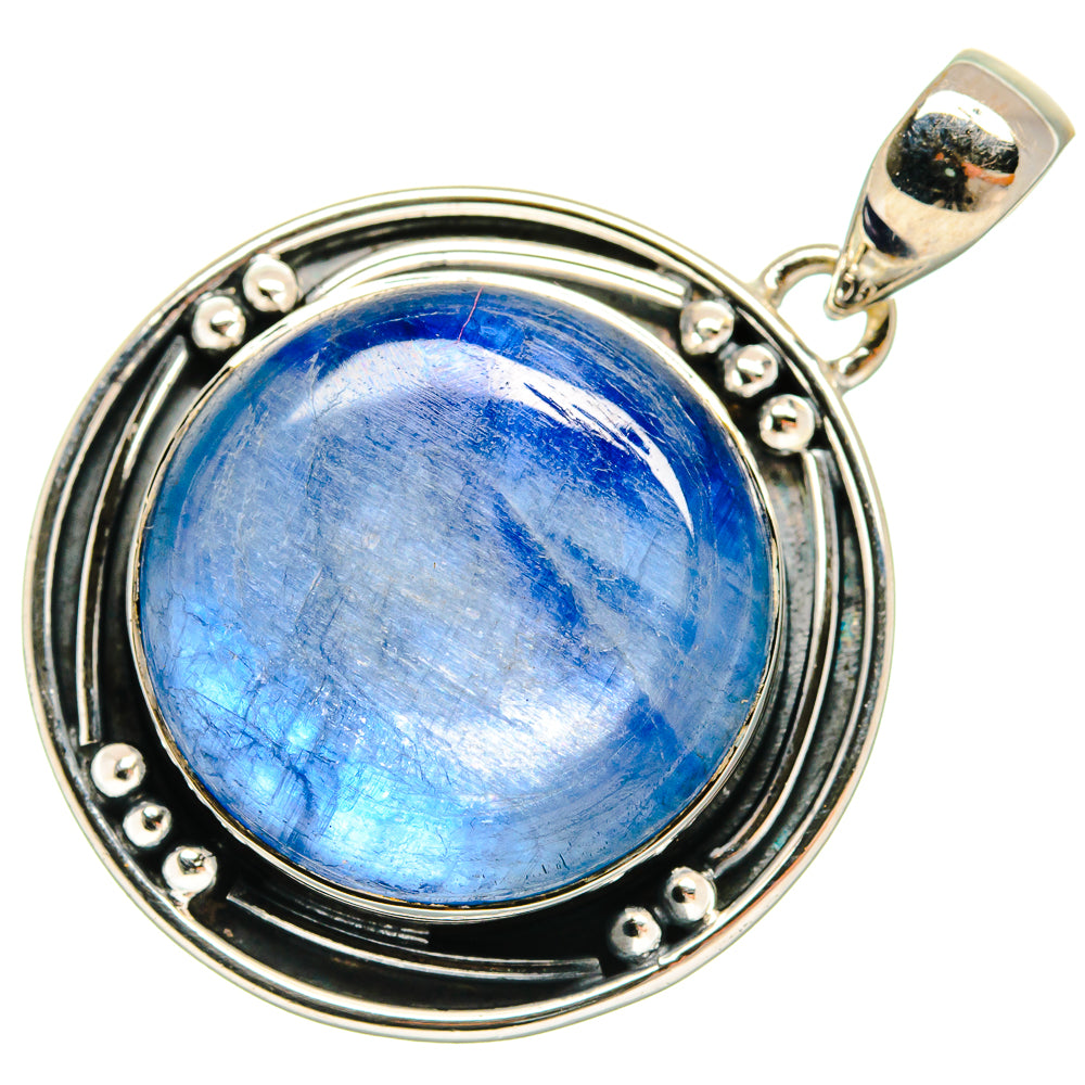 Round blue kyanite pendant in 925 sterling silver with layered border and metal bail