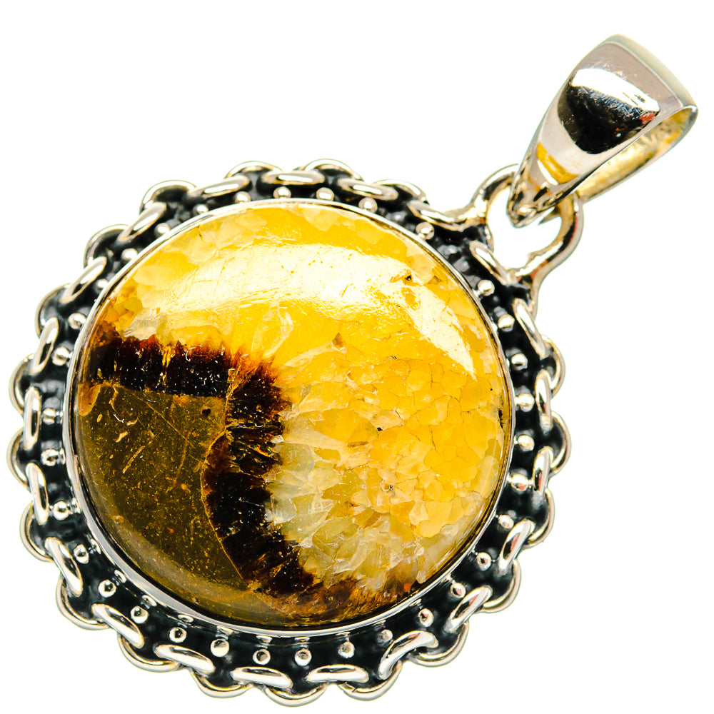 Septarian nodule pendant: oval amber stone with black veining, set in sterling silver