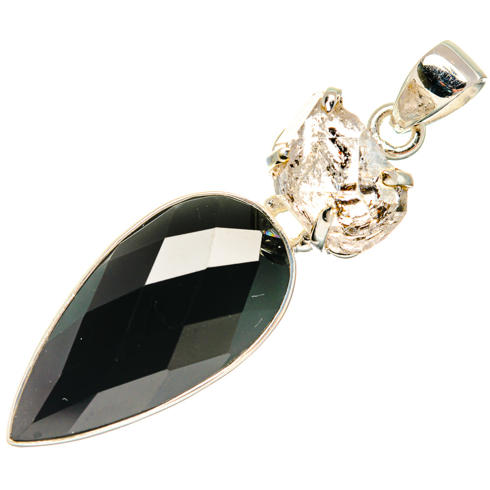 Sterling silver pendant featuring faceted black onyx teardrop with clear diamond crystal top