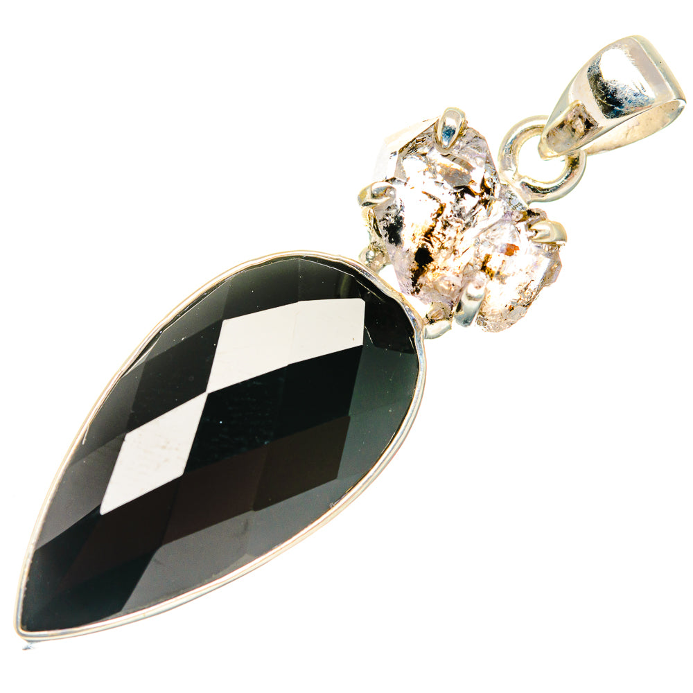 Black onyx teardrop pendant with silver bail and small herkimer diamond cluster