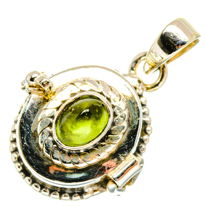 Sterling silver pendant with round green peridot gemstone bezel and ornate halo setting