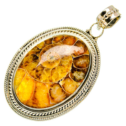 Oval ammonite fossil pendant, sterling silver bezel with amber-brown swirl pattern
