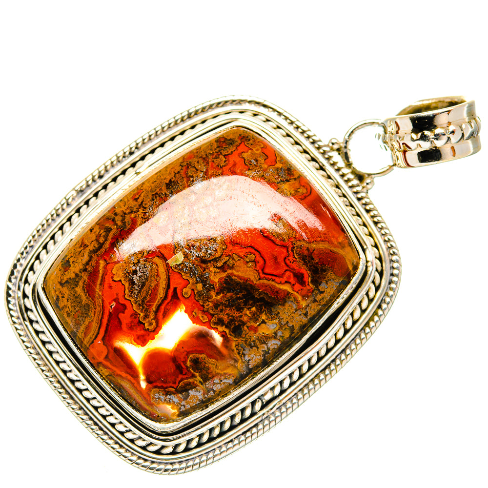 Oval silver frame Moroccan agate pendant with orange patterns and attached gold clasp