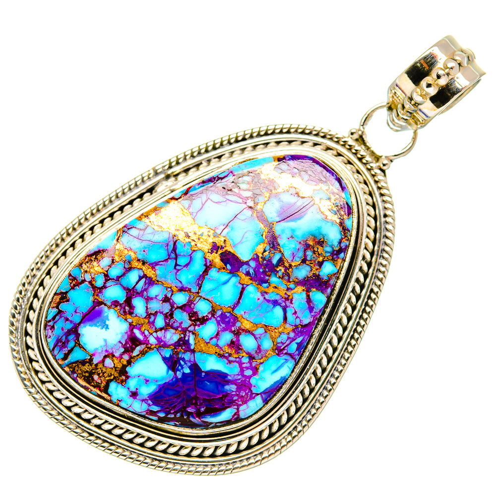 Teardrop turquoise pendant with purple-blue veined stone, ornate silver border and top bail