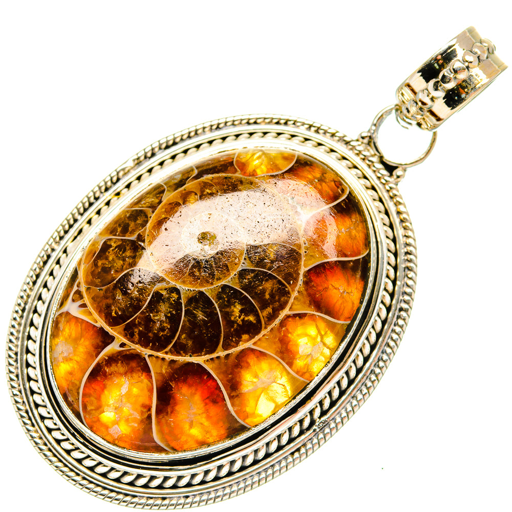 Oval ammonite fossil pendant with beaded silver border and clasp, warm amber fossil detail