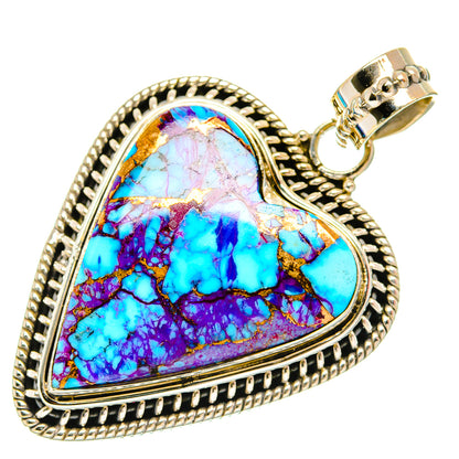 Heart-shaped turquoise pendant with purple-blue stone, ornate silver bezel and bail