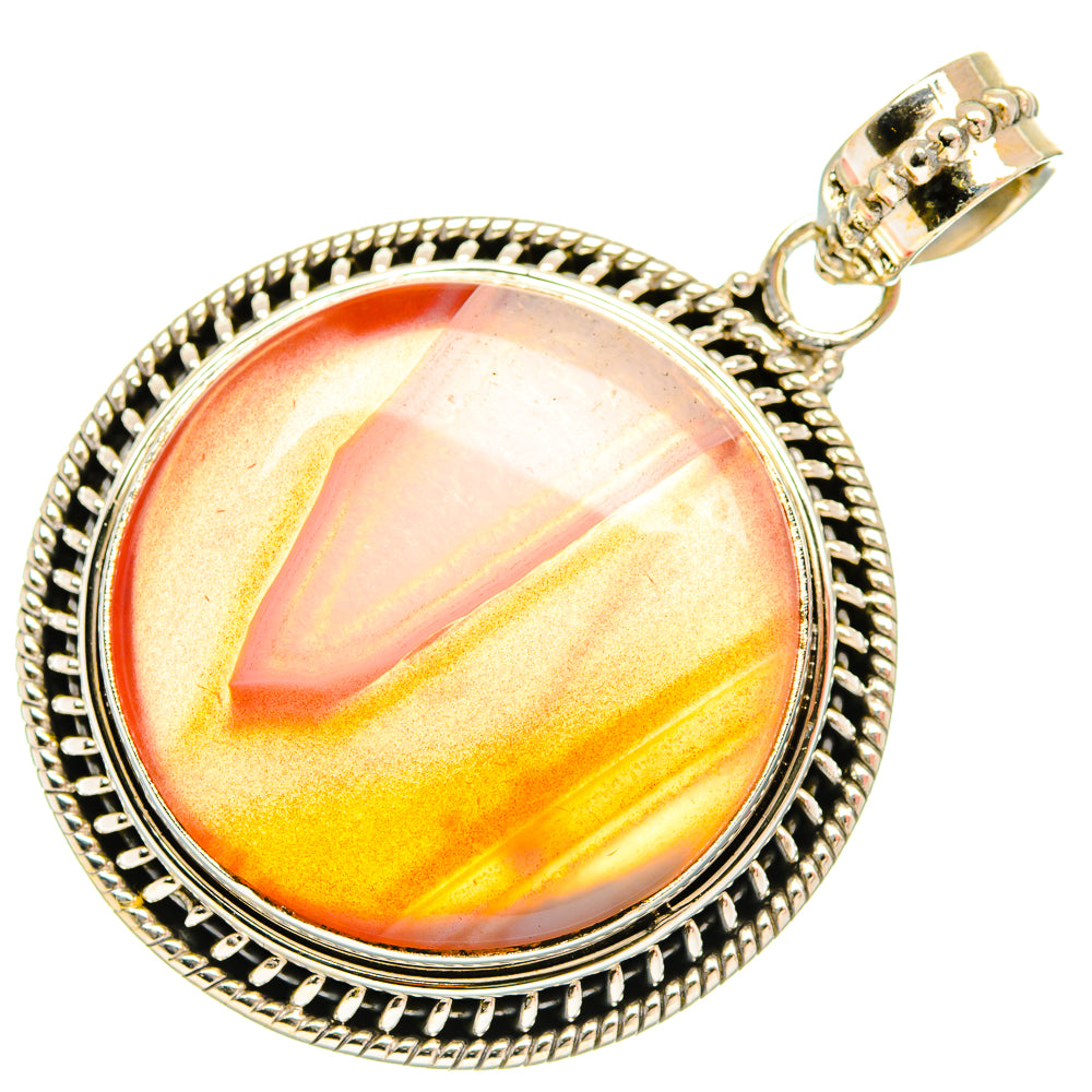 Round red-orange agate pendant with 925 sterling silver bail and textured frame