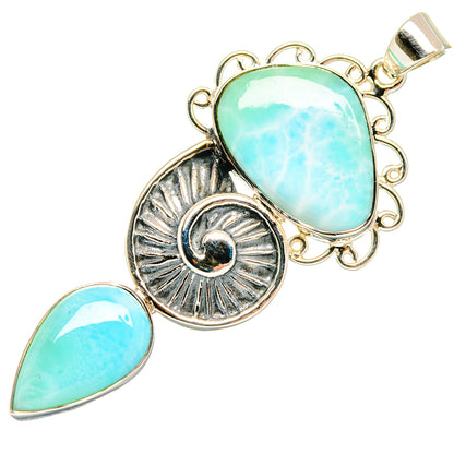 Larimar oval pendant with sunburst silver medallion, teardrop stone, and looped bail