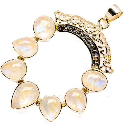 Rainbow moonstone pendant in sterling silver with teardrop stones and ornate frame
