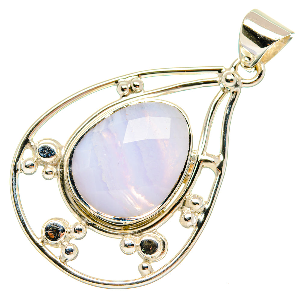 Sterling silver teardrop pendant with light blue lace agate cabochon and small bezel stones