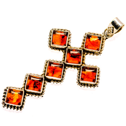 Amber square cross pendant in silver-tone frame with top bail loop