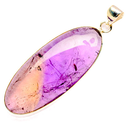 Teardrop ametrine gemstone pendant in lavender and golden hues with silver bail