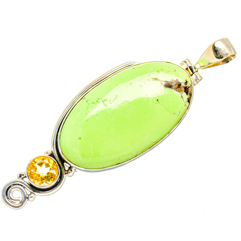 Silver pendant featuring oval green chrysoprase with small round citrine and bail