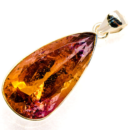 Faceted ametrine teardrop pendant with amber and maroon tones in sterling silver bezel