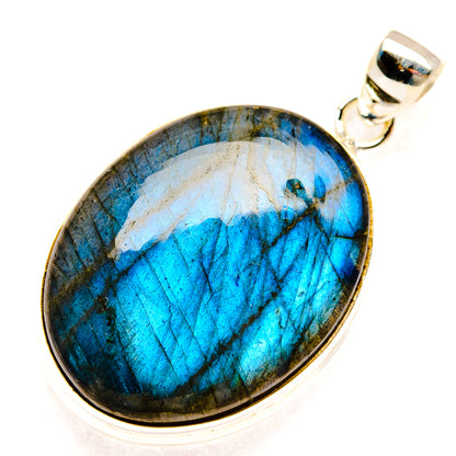 Labradorite oval pendant in 925 sterling silver with blue iridescent stone and bail