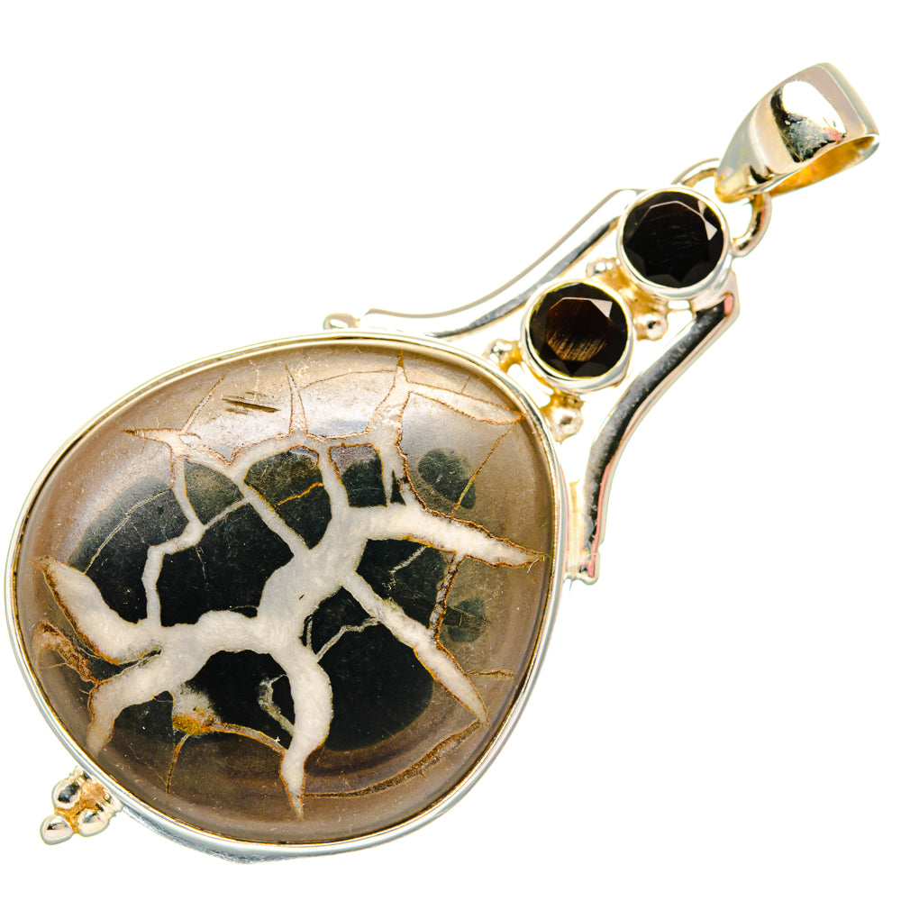 Septarian geode pendant with black cabochon cluster and round silver loop