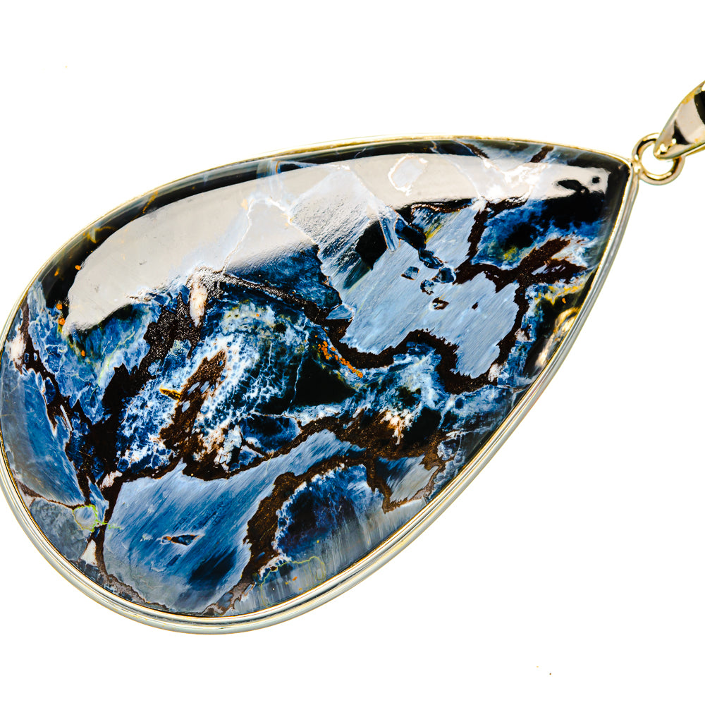 Large teardrop pietersite pendant with blue-black stone in silver-tone bezel.