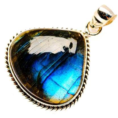 Labradorite pendant in oval teardrop bezel, blue-black iridescent stone, sterling silver bail