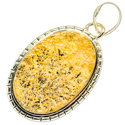 Sterling silver oval dendrite pendant with yellow stone and black branching inclusions, loop bail