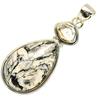 Sterling silver pendant: marbled white/black teardrop stone with small clear crystal bezel