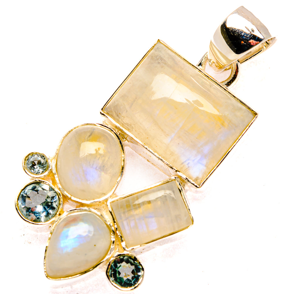 Sterling silver pendant with large rectangular moonstone and clustered round blue topaz stones