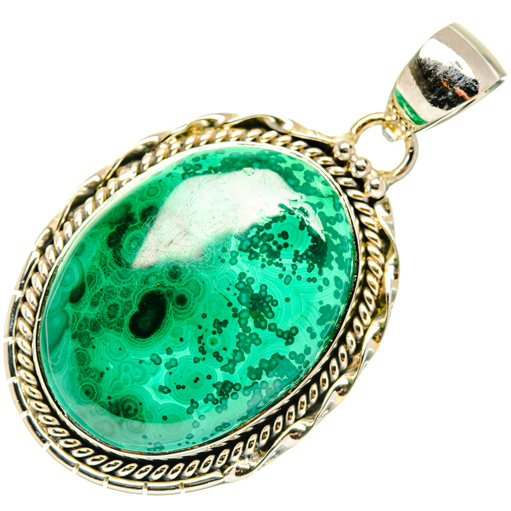 Oval green malachite chrysocolla pendant with sterling silver rope bezel and bail.