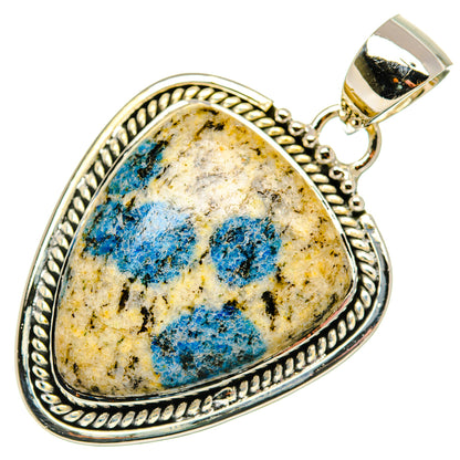 Sterling silver teardrop pendant with azurite cabochon and polished bail, rope bezel